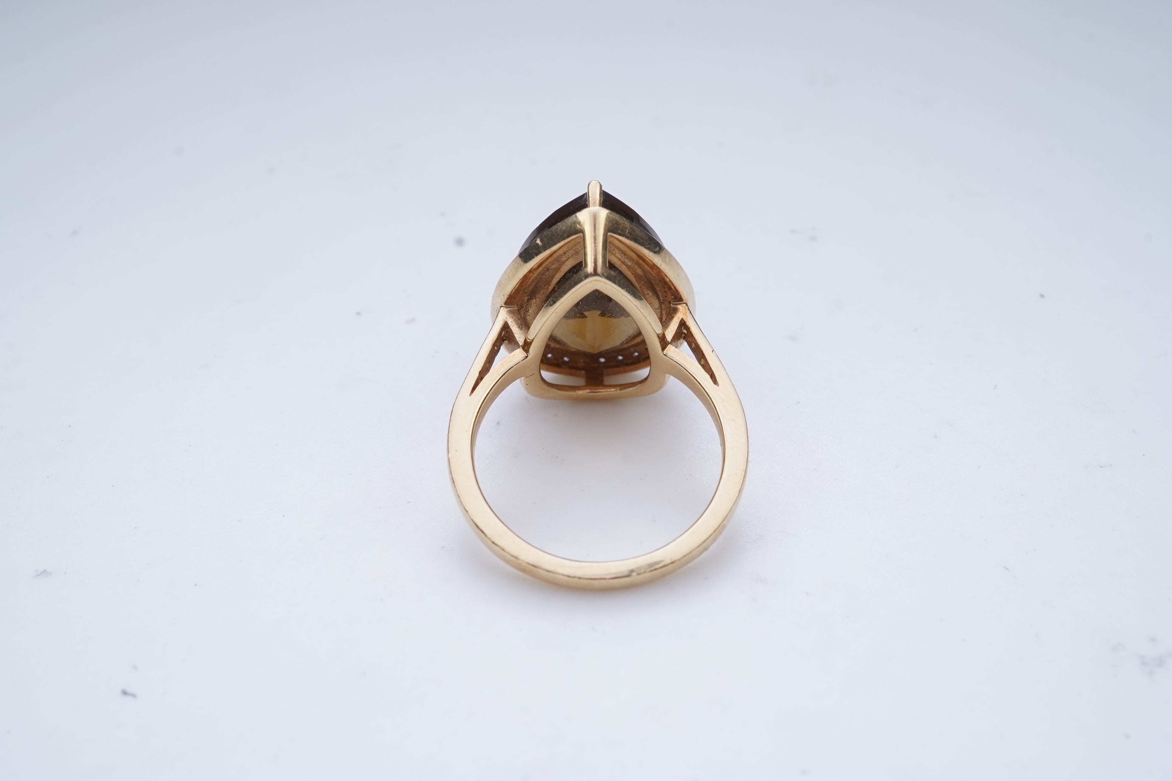 A smoky quartz and diamond ring